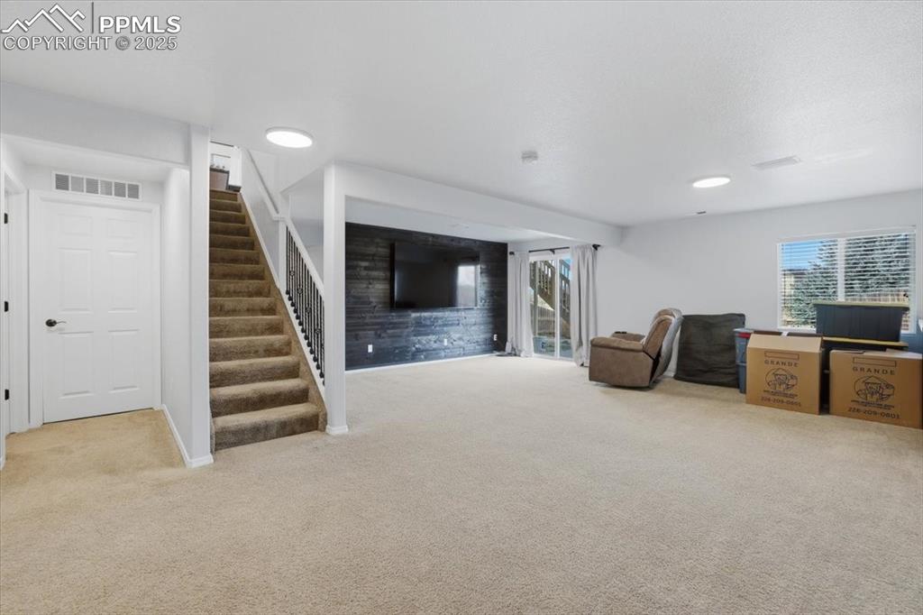 Image 20 of 30: Walk out basement family room