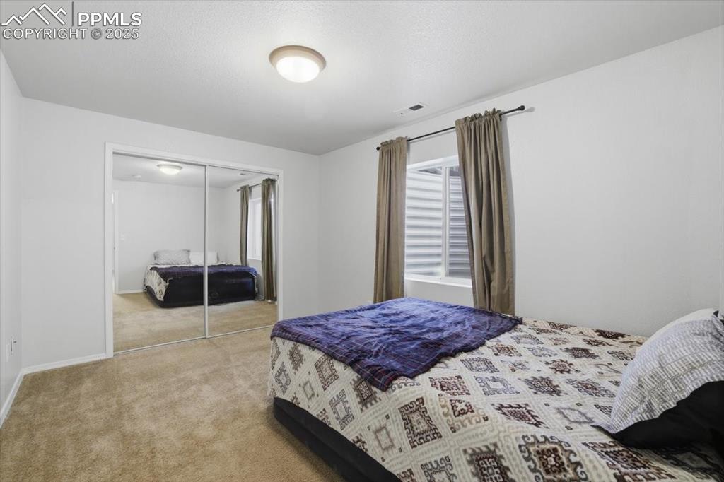 Image 23 of 30: Bedroom