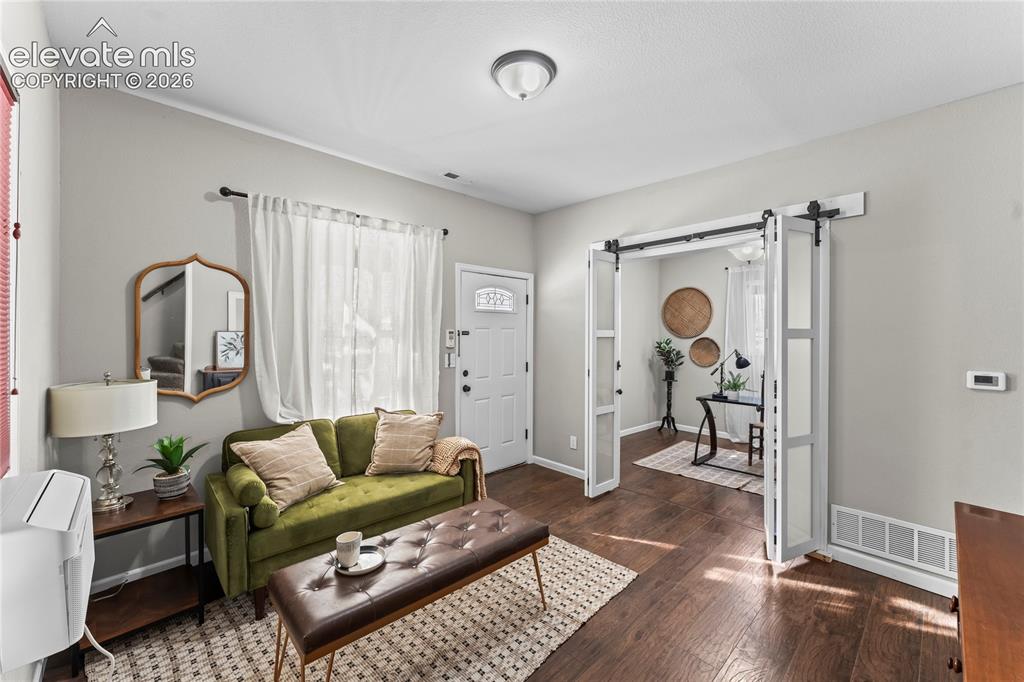 Image 2 of 22: Living room and flex space