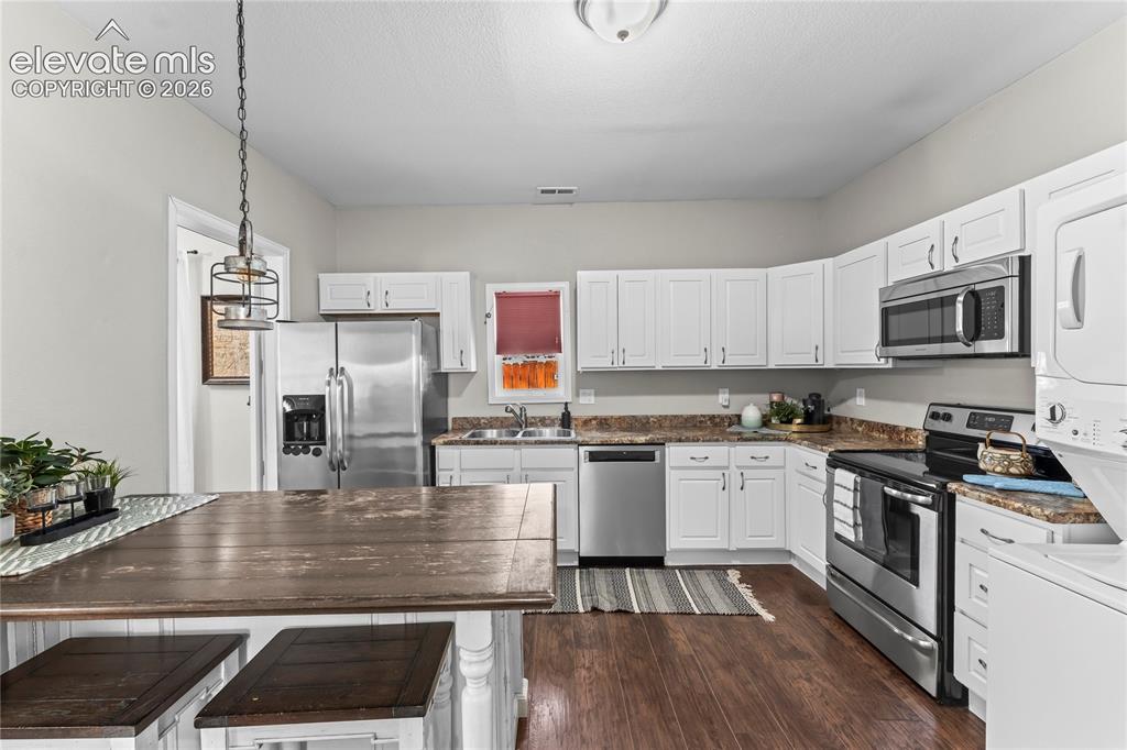 Image 3 of 22: Updated open Kitchen