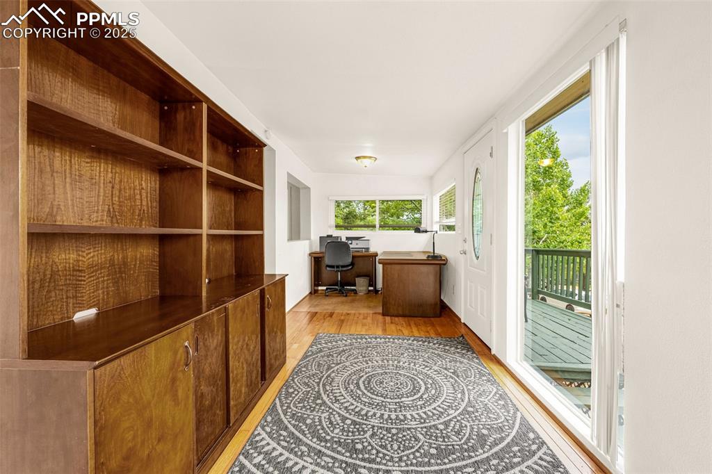 Image 4 of 31: Home office featuring light wood finished floors