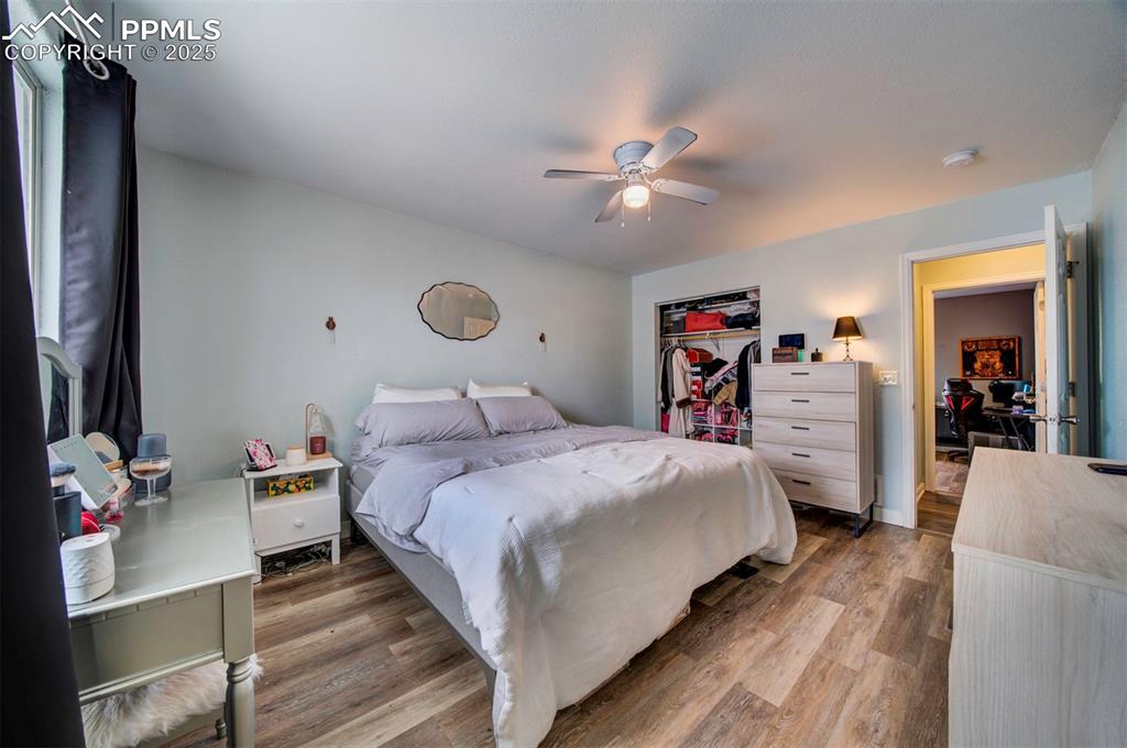 Image 19 of 25: Bedroom featuring ceiling fan