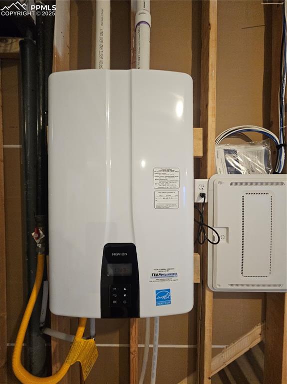 Image 12 of 12: Utilities with water heater