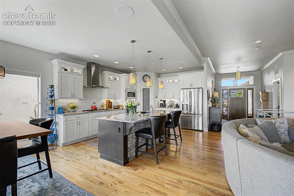Image 13 of 49: Beautiful kitchen with an 8-foot granite countertop, over and under cabinet