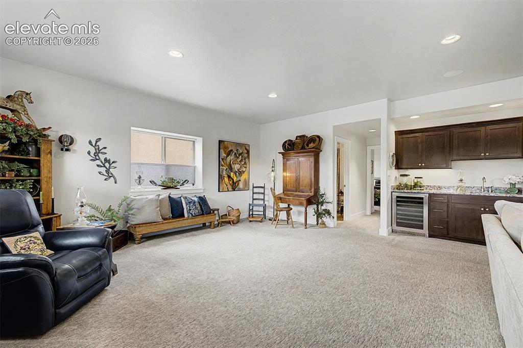 Image 31 of 49: Lots of extra space for a gaming table, billiards table, sitting area, or e