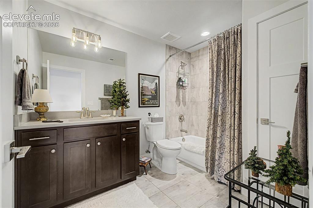Image 38 of 49: Another beautiful large bathroom in the basement.