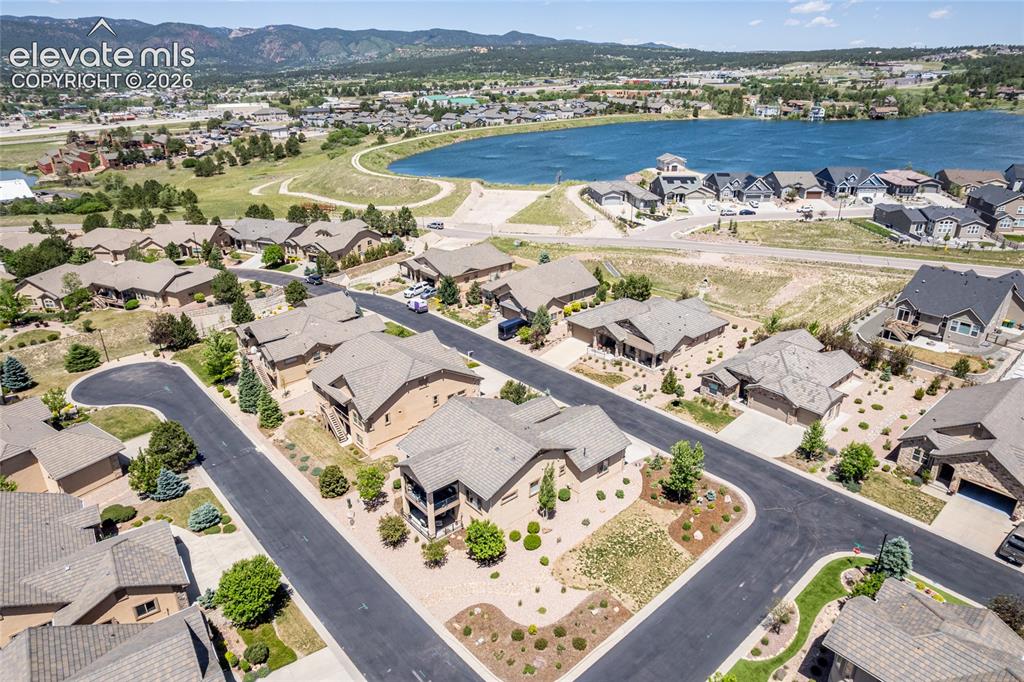 Image 47 of 49: Enjoy Lake Woodmoor and mountain views on your walk morning, noon, or night