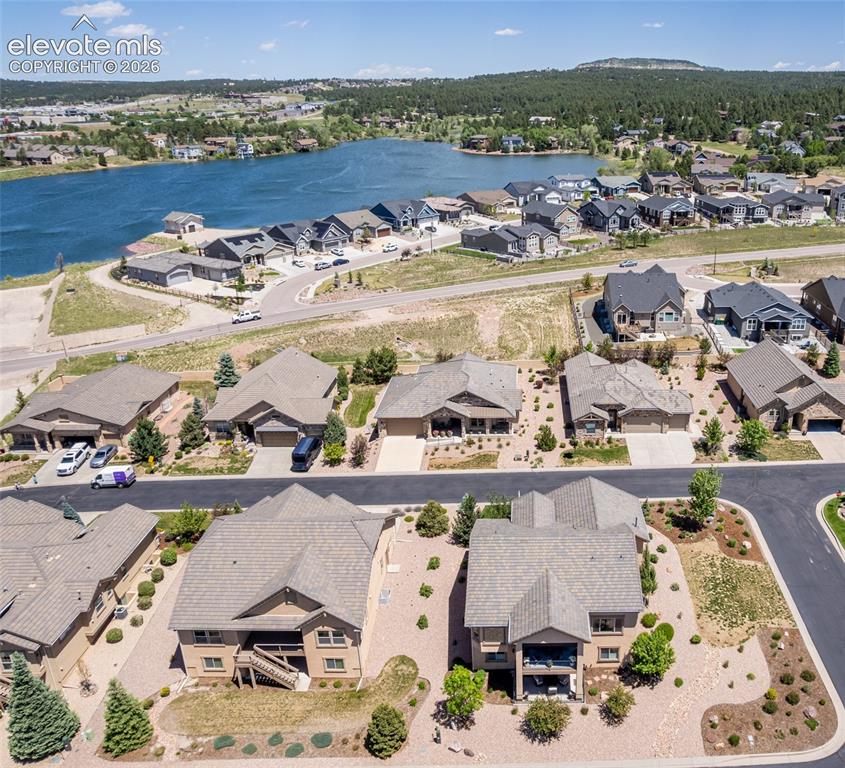 Image 6 of 49: Within walking distance to Lake Woodmoor!