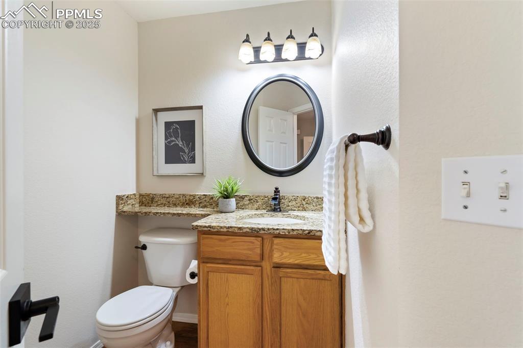 Image 13 of 39: Main Level Powder Room