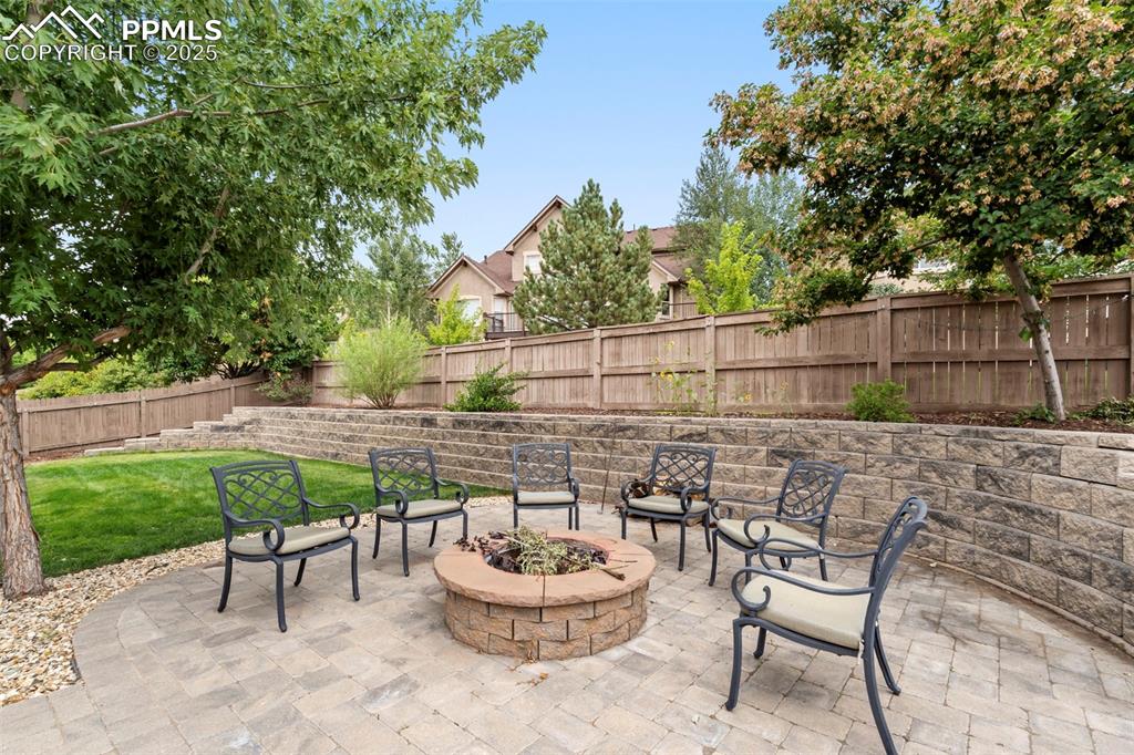 Image 37 of 39: Amazing Fire Pit and Seating area