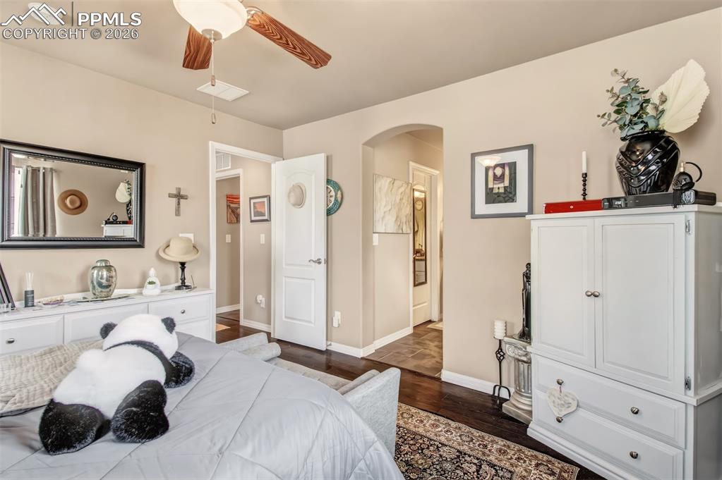 Image 17 of 32: Primary bedroom with en suite bathroom, walk in closet and views just outsi