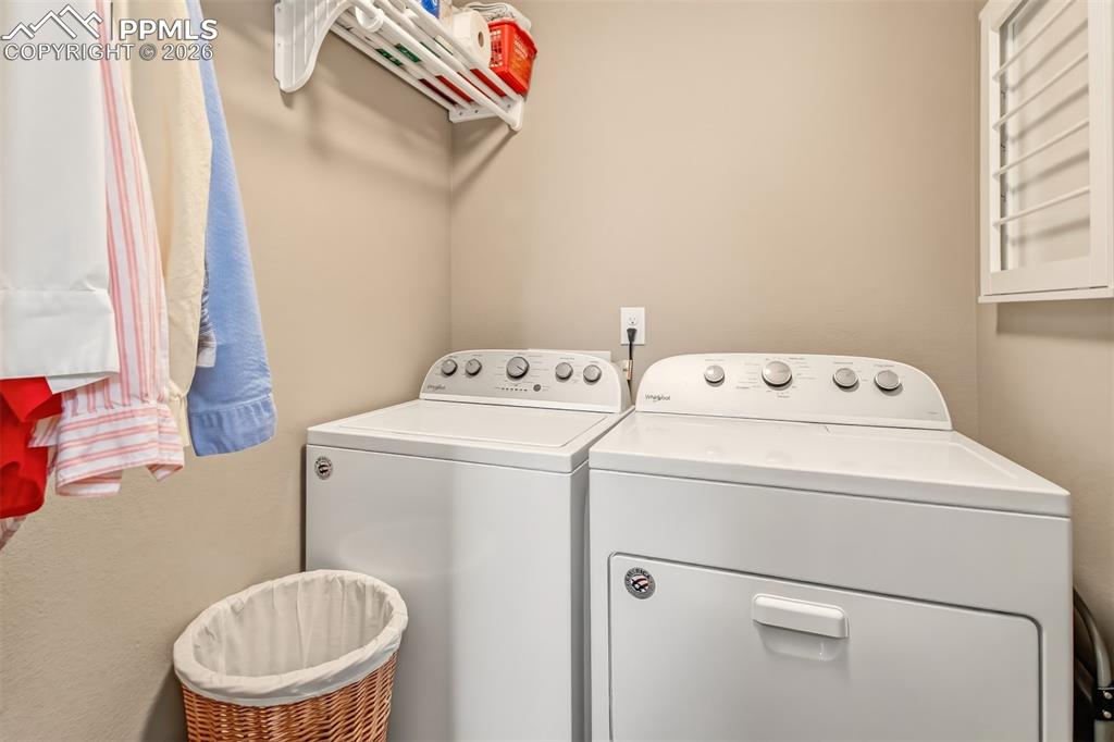 Image 20 of 32: Laundry on the upper level