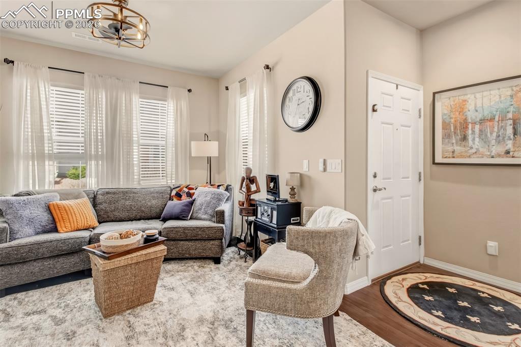 Image 4 of 32: Open concept living room on the main level