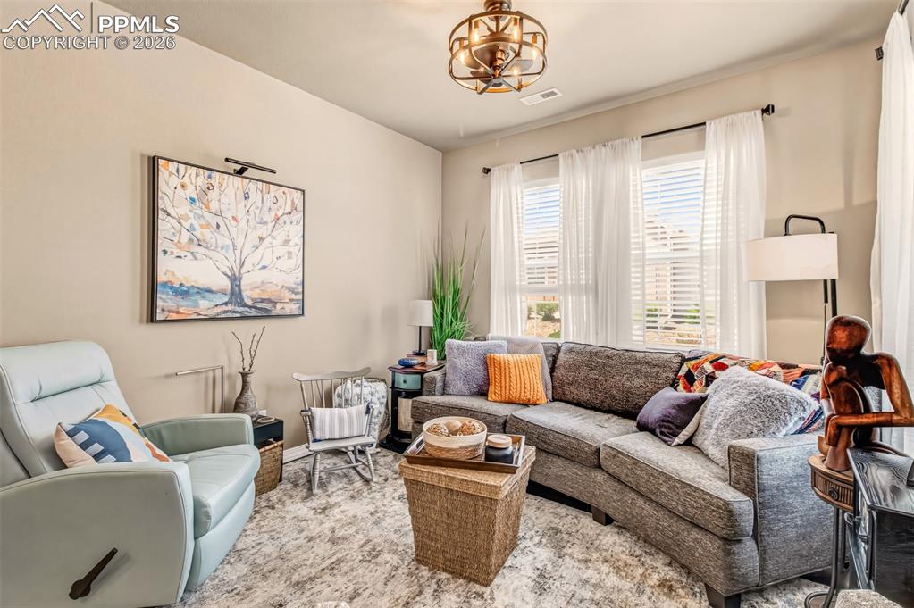Image 5 of 32: Open concept living room on the main level