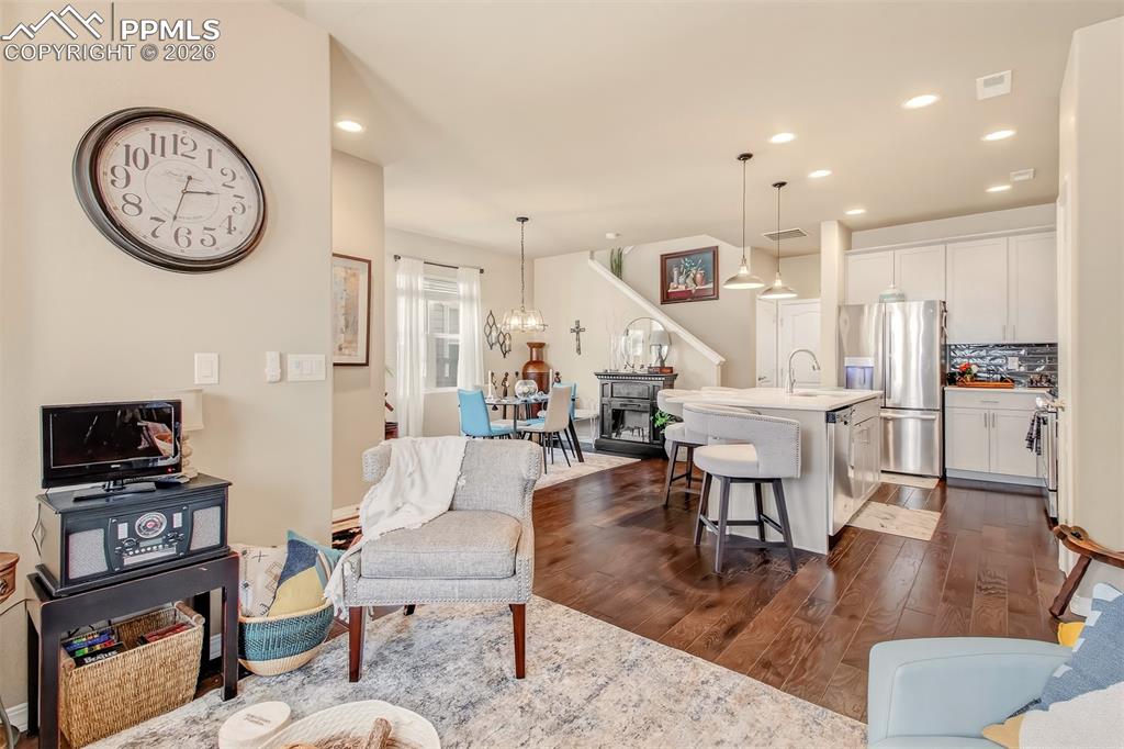 Image 6 of 32: Open concept living room on the main level