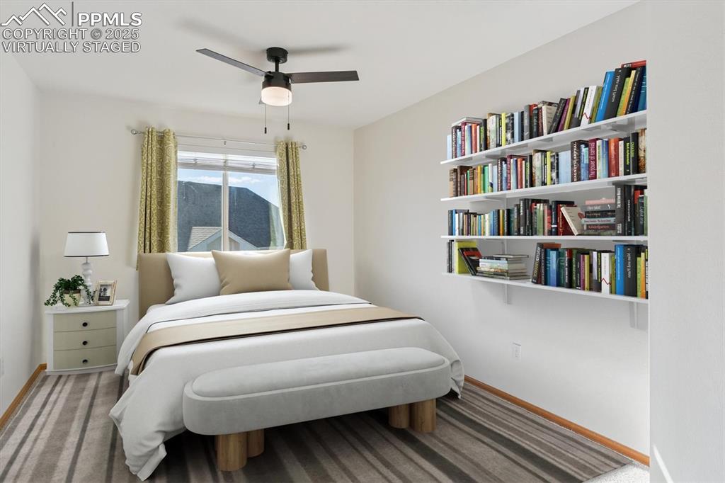 Image 32 of 45: Virtually staged, Carpeted bedroom with a ceiling fan and baseboards