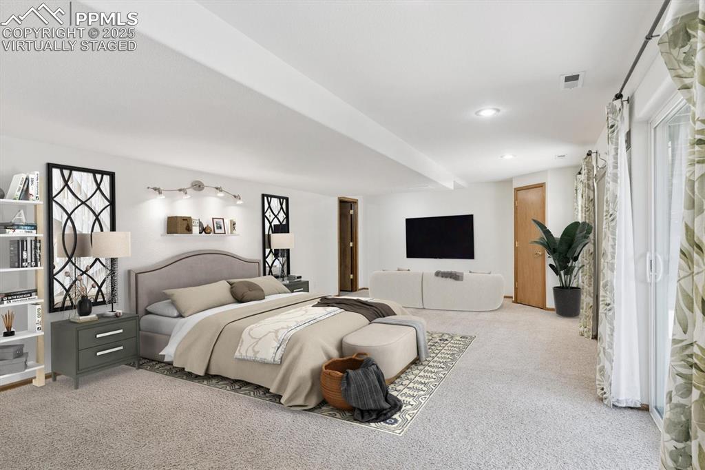 Image 40 of 45: Bedroom featuring        
Virtually staged, Carpet floors and recessed lig