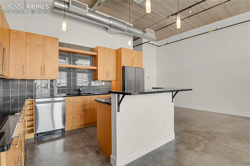 Image 12 of 42: View of Kitchen looking towards Entry Hall