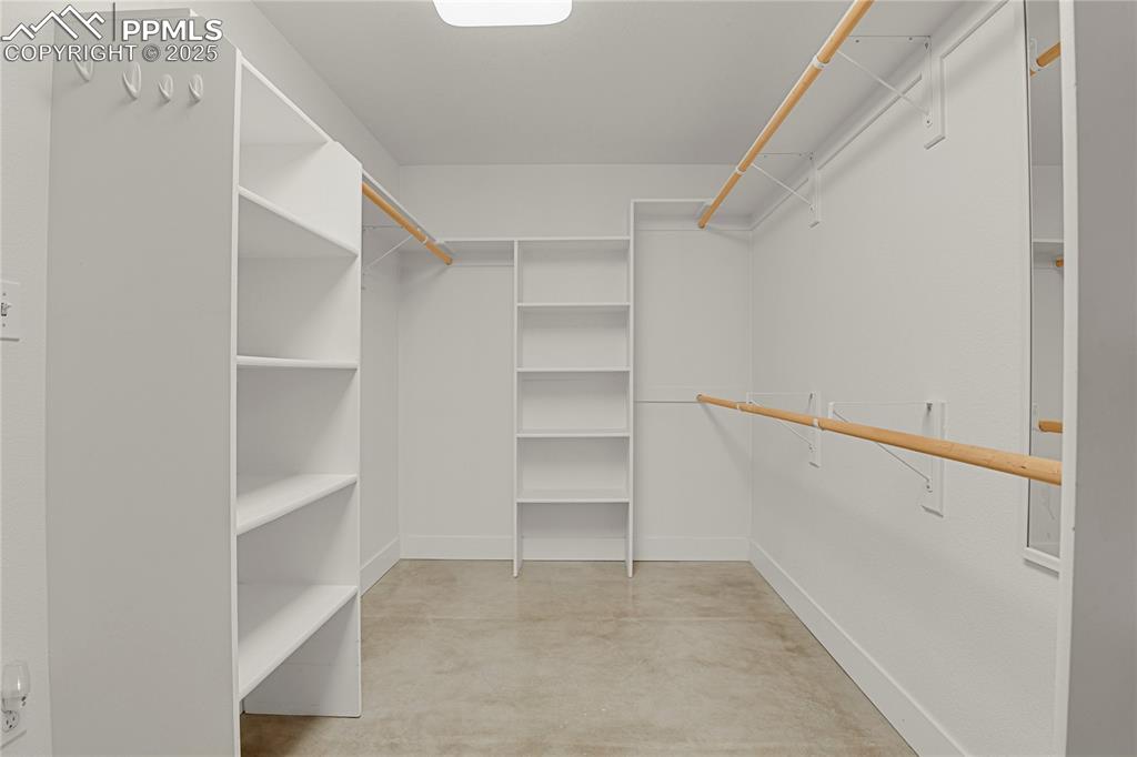 Image 29 of 42: Custom built-in closet shelving