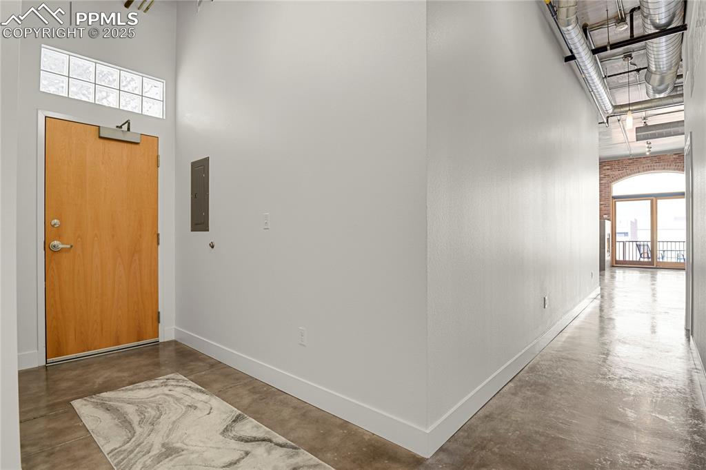 Image 32 of 42: Entryway with large coat closet