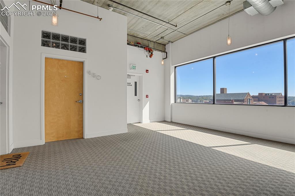 Image 33 of 42: Easy access to stairwell to garage