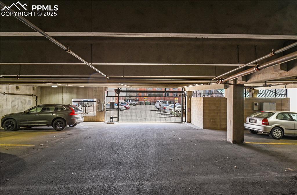 Image 36 of 42: Secure garage entry with automatic gate