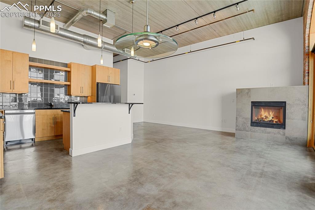 Image 6 of 42: Living/Dining Area/Kitchen