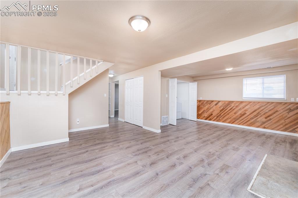 Image 28 of 30: Downstairs living room