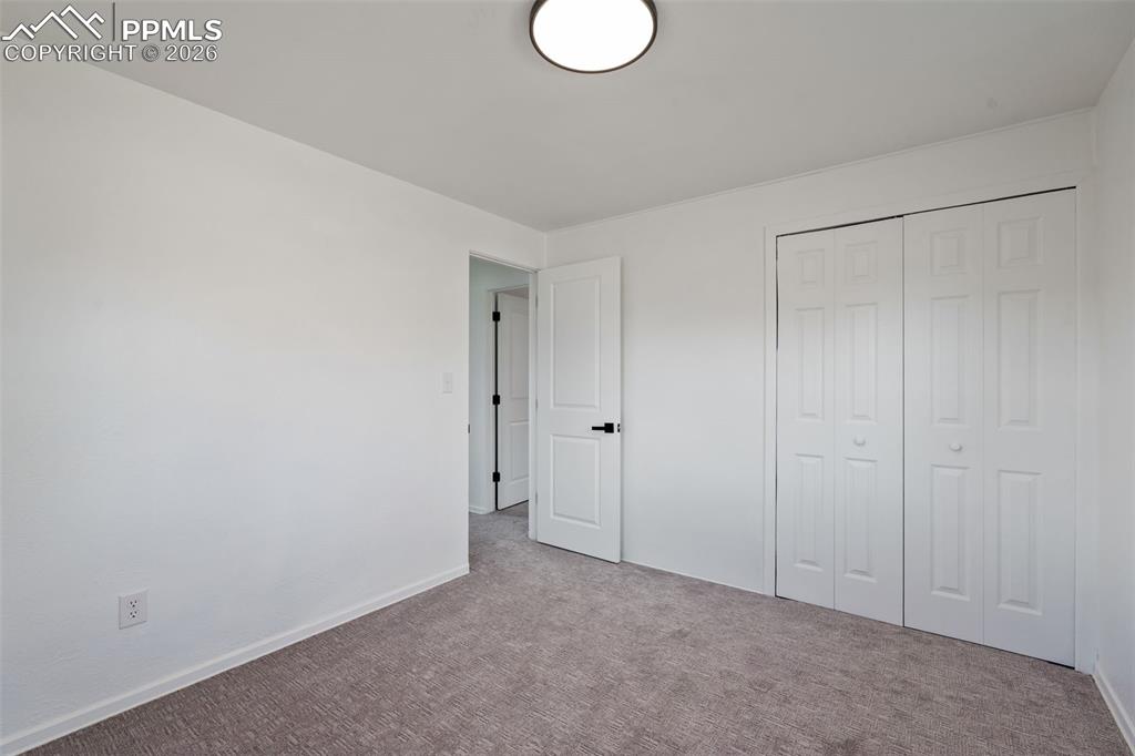 Image 20 of 26: Bedroom