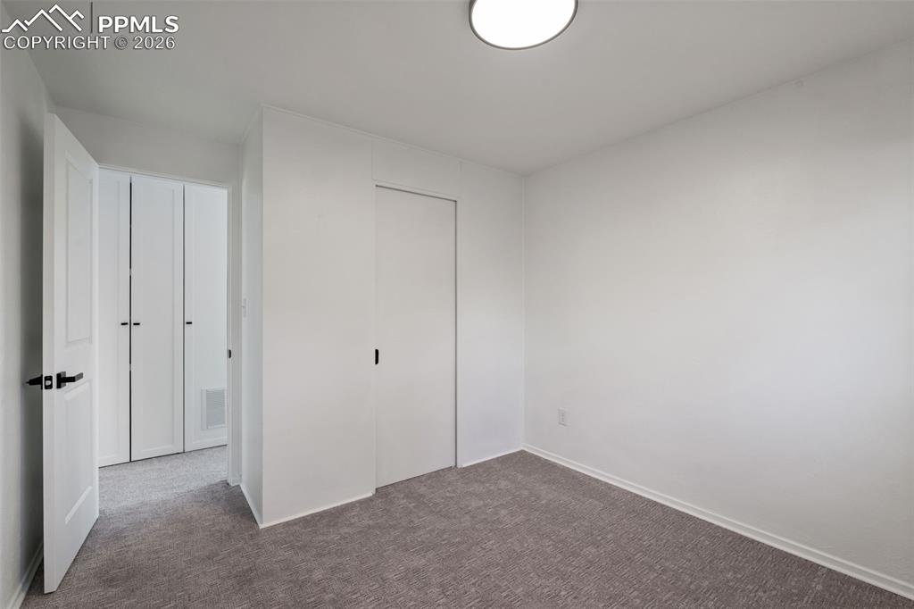 Image 22 of 26: Bedroom