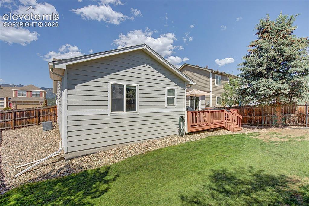 Image 27 of 48: The dining area opens out to the rear deck and backyard!
