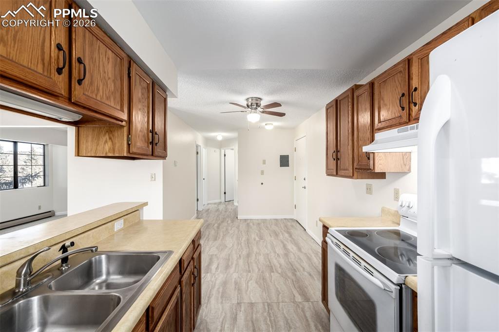 Image 12 of 35: Galley Kitchen to make cooking a breeze