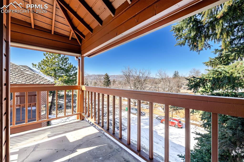 Image 22 of 35: Spacious Balcony with Mountain Views