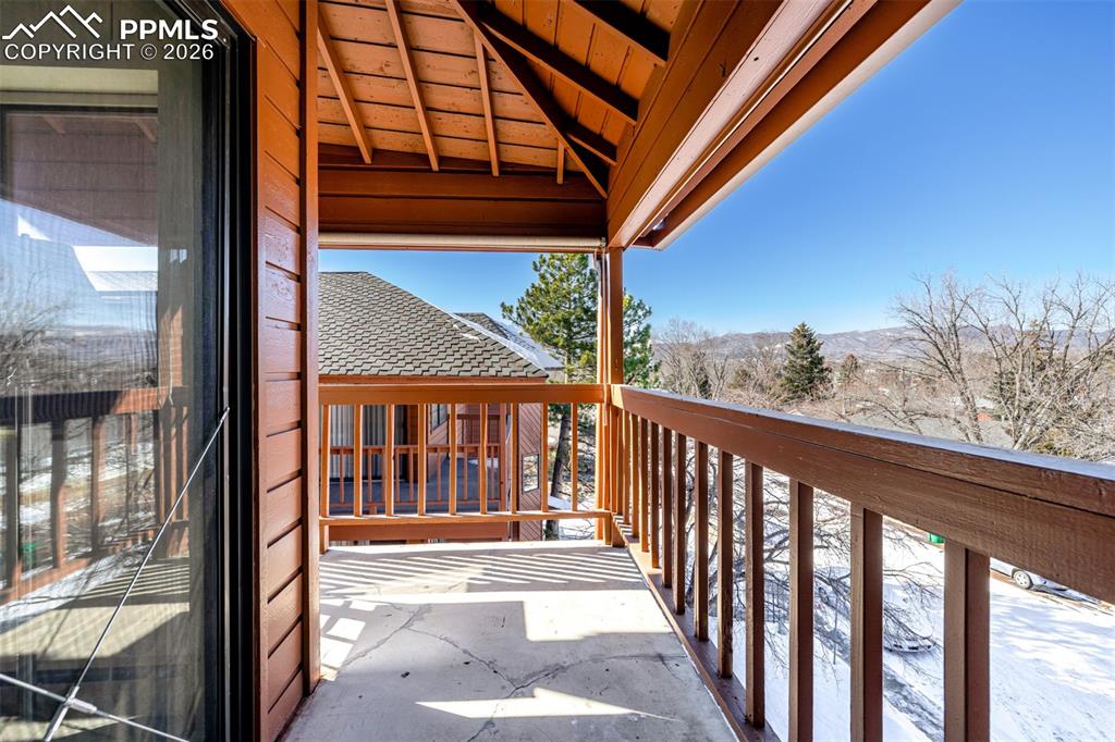 Image 23 of 35: Spacious Balcony with Mountain Views