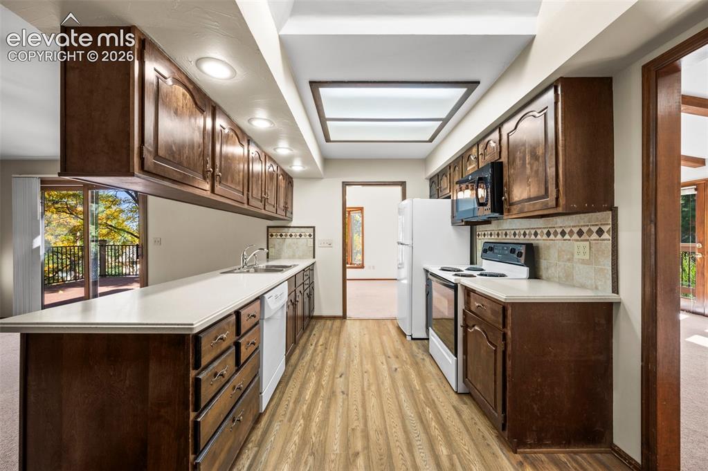 Image 16 of 47: Dining and Living room