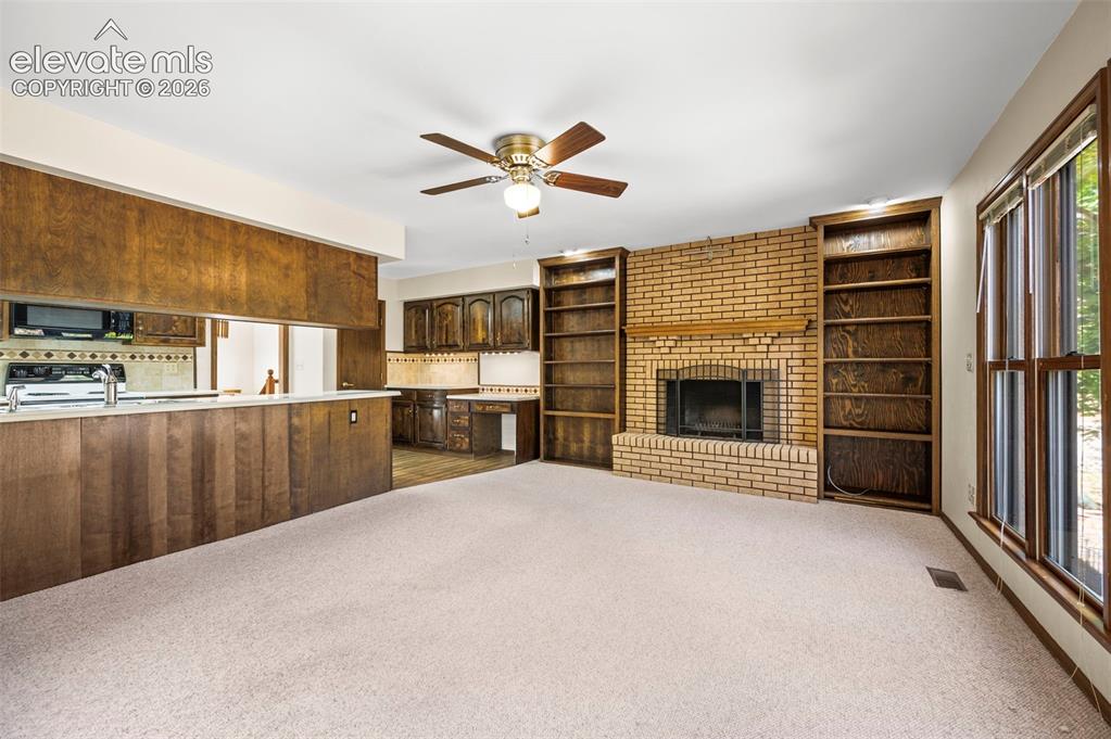 Image 18 of 47: Virtually Staged Dining and LR