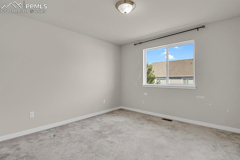 Image 21 of 31: Unfurnished room featuring light colored carpet and baseboards