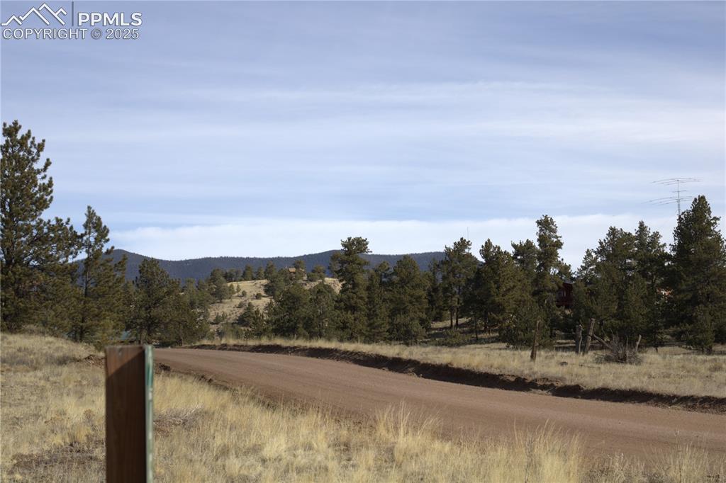 Image 11 of 20: Mountain view with rural landscape
