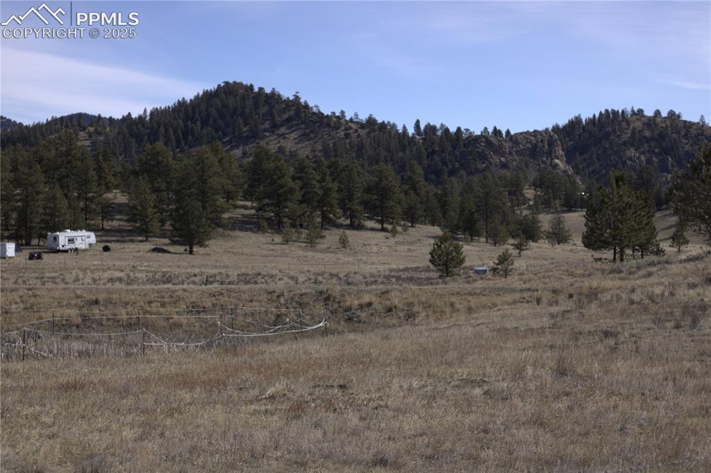 Image 15 of 20: Mountain view with rural landscape