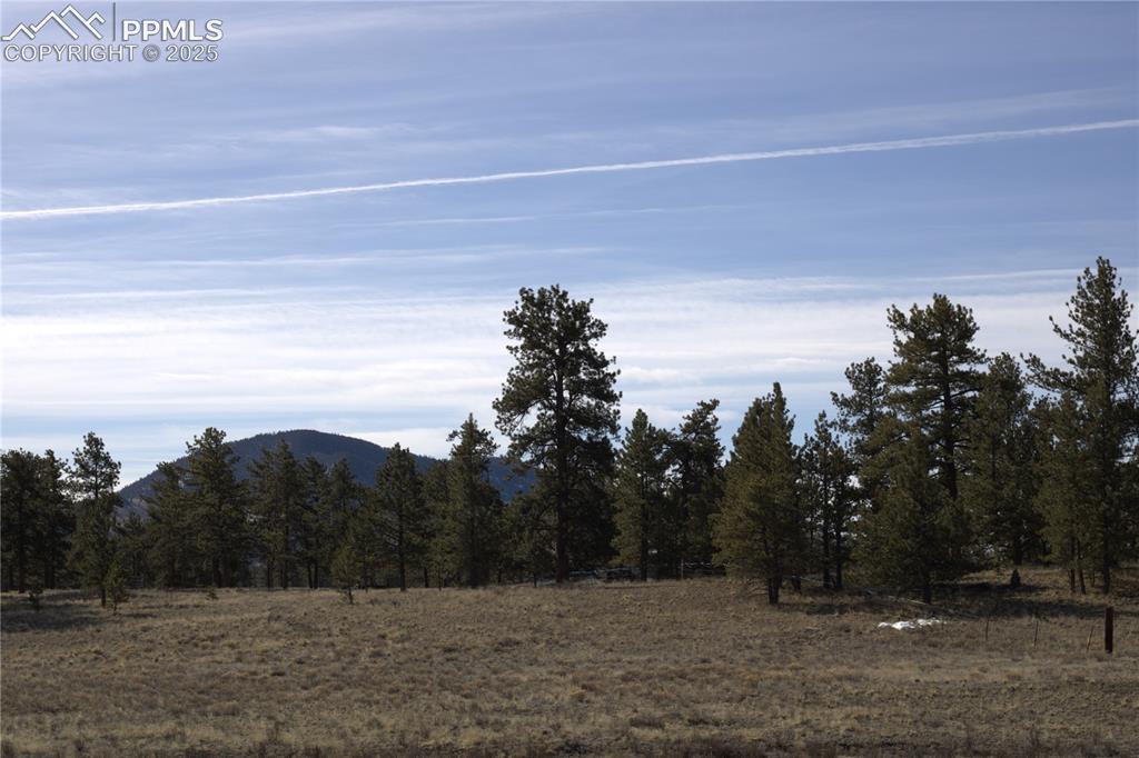 Image 7 of 20: Mountain view with rural landscape