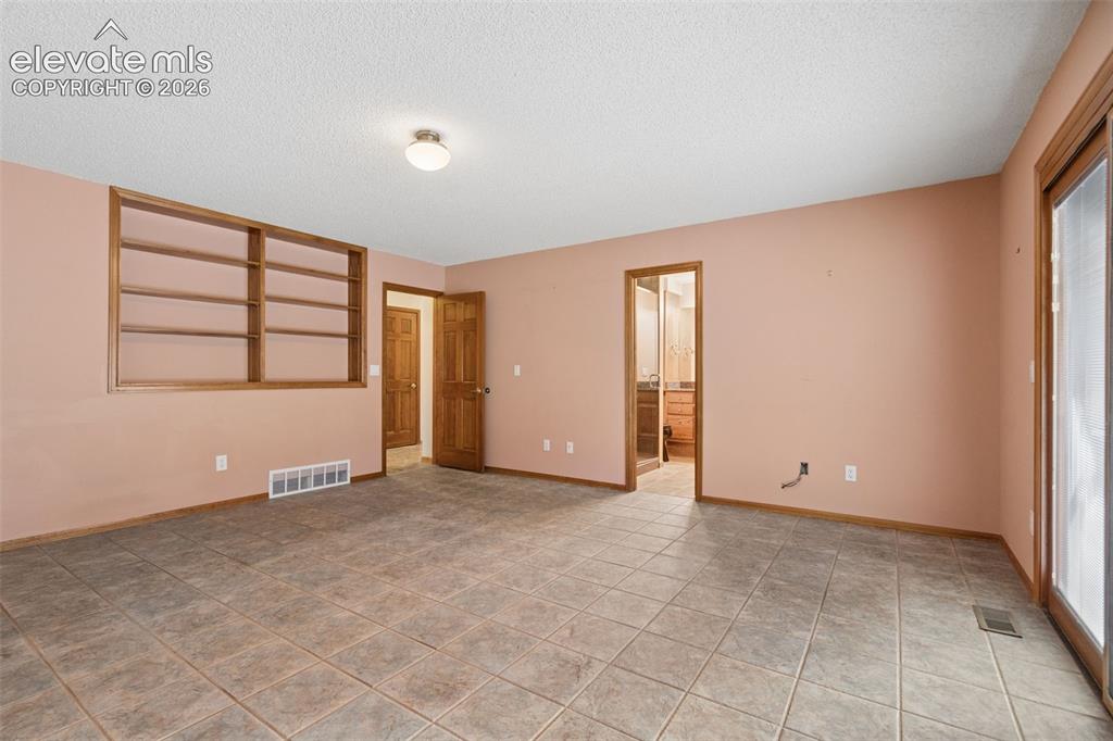 Image 20 of 50: Master Bedroom