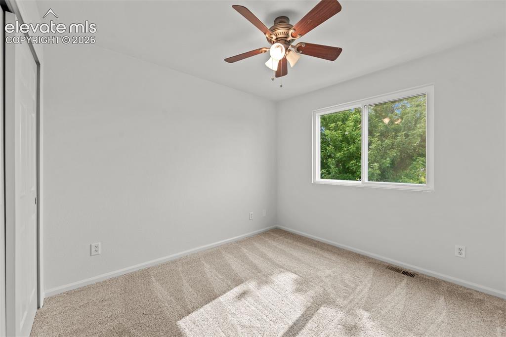 Image 19 of 31: One of 3 upstairs bedrooms