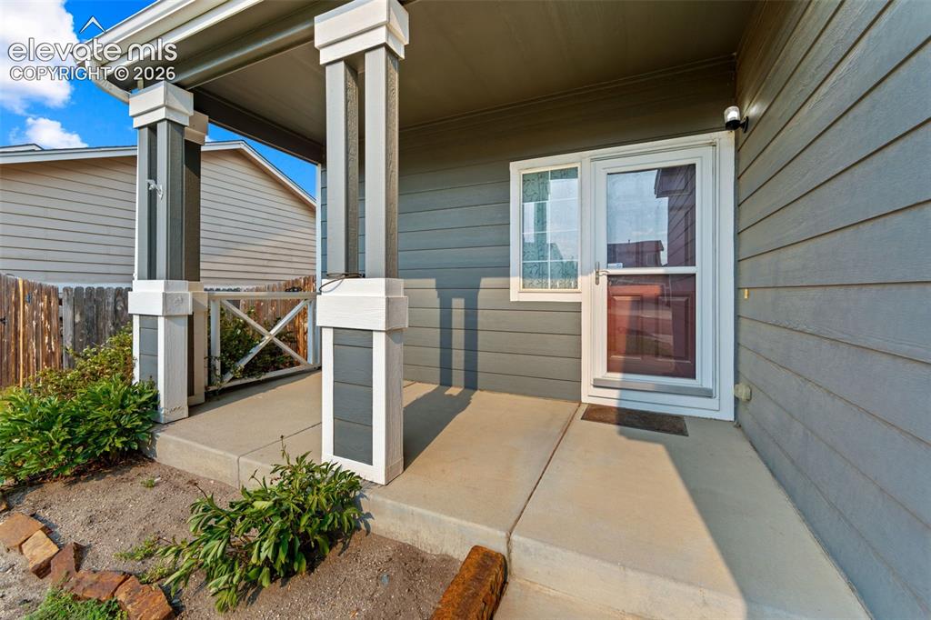 Image 2 of 31: Inviting front porch