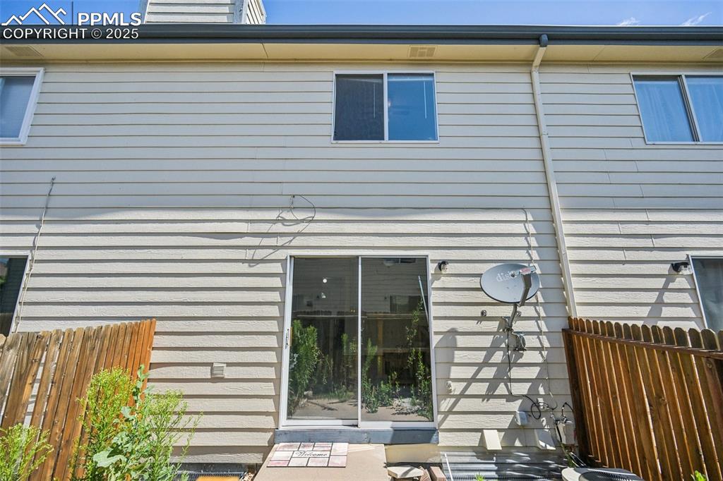 Image 26 of 28: Rear view of house