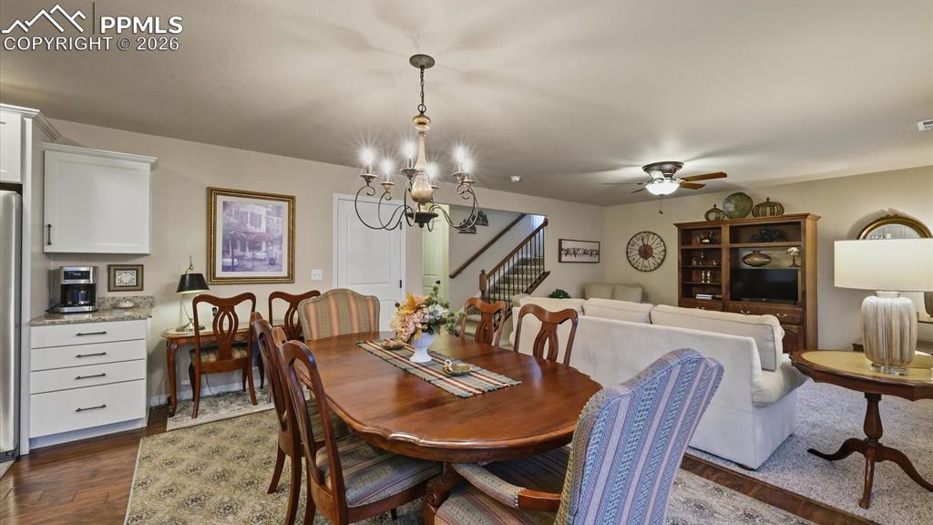 Image 14 of 50: The Dining Area has an attractive new modern light fixture.