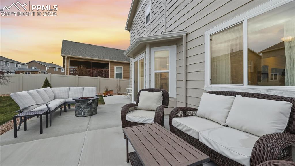 Image 17 of 50: Backyard patio located off the Dining Area.