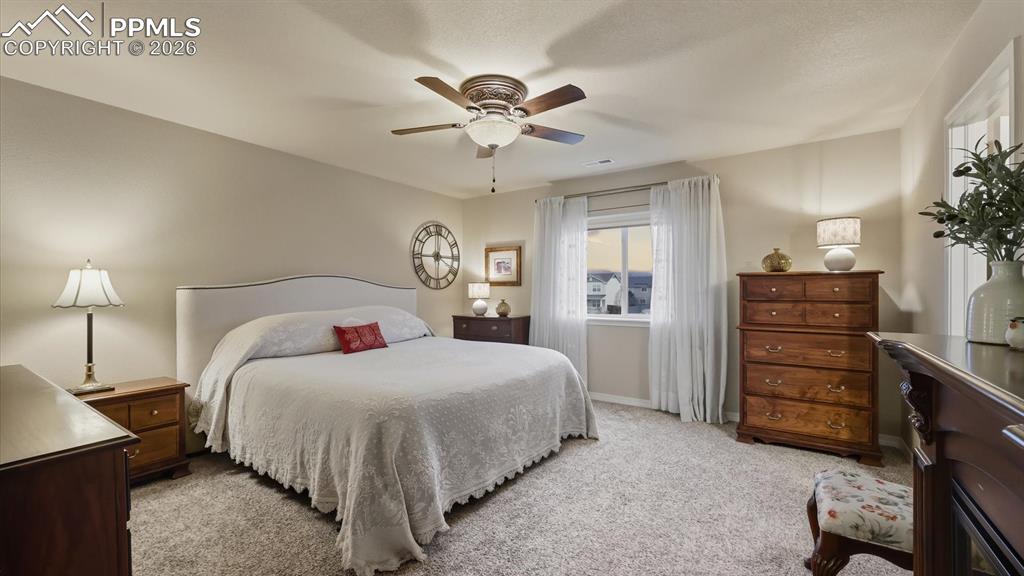 Image 23 of 50: Upper Level Primary Bedroom.