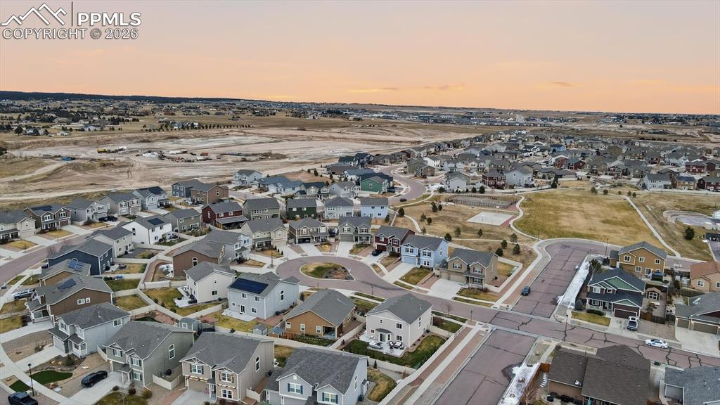Image 47 of 50: Aerial view of home and neighborhood.