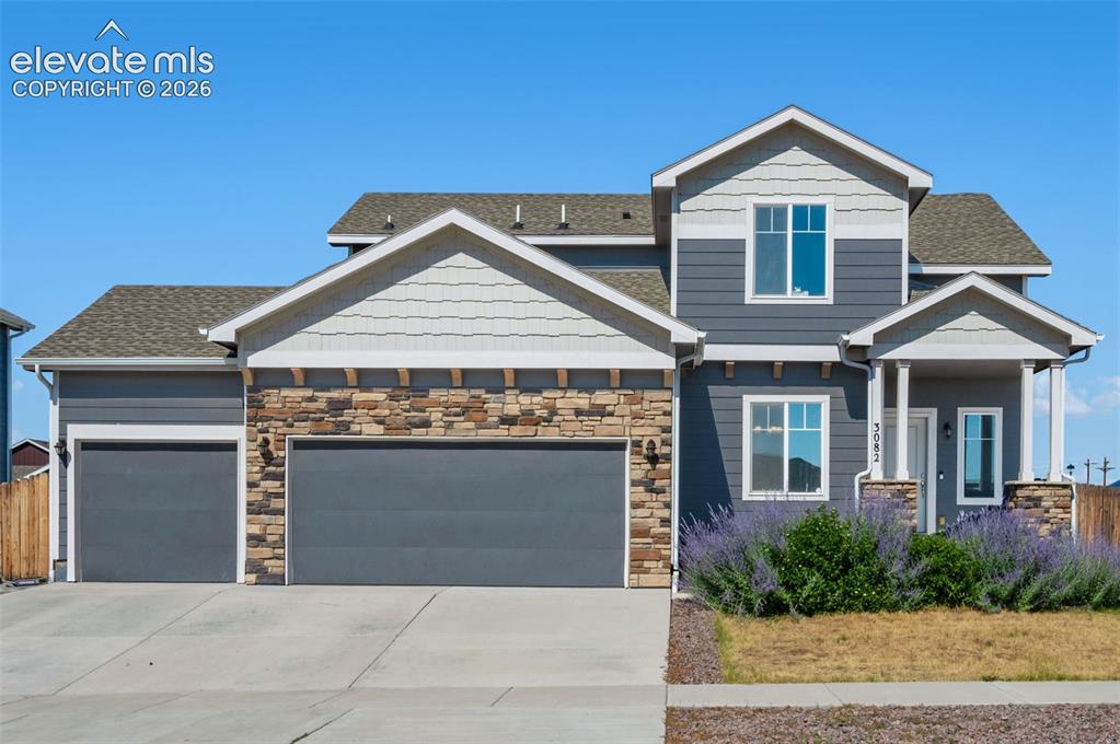 Caption: Corner lot 3 bed home with 3 car garage