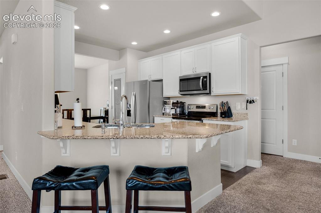 Image 12 of 40: This home has a great kitchen with